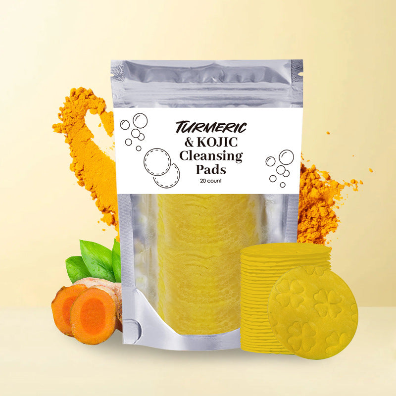 Turmeric Exfoliating Cleansing Pads in packaging with sponges and turmeric background for deep cleansing.